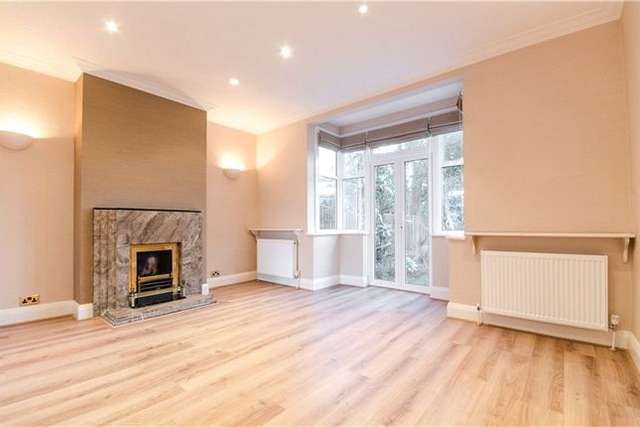 Detached house to rent in Burdett Avenue, West Wimbledon, London SW20